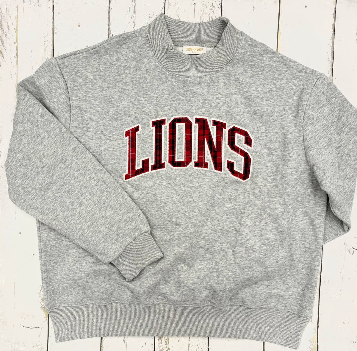 DT LIONS Faith Plaid Mock Neck